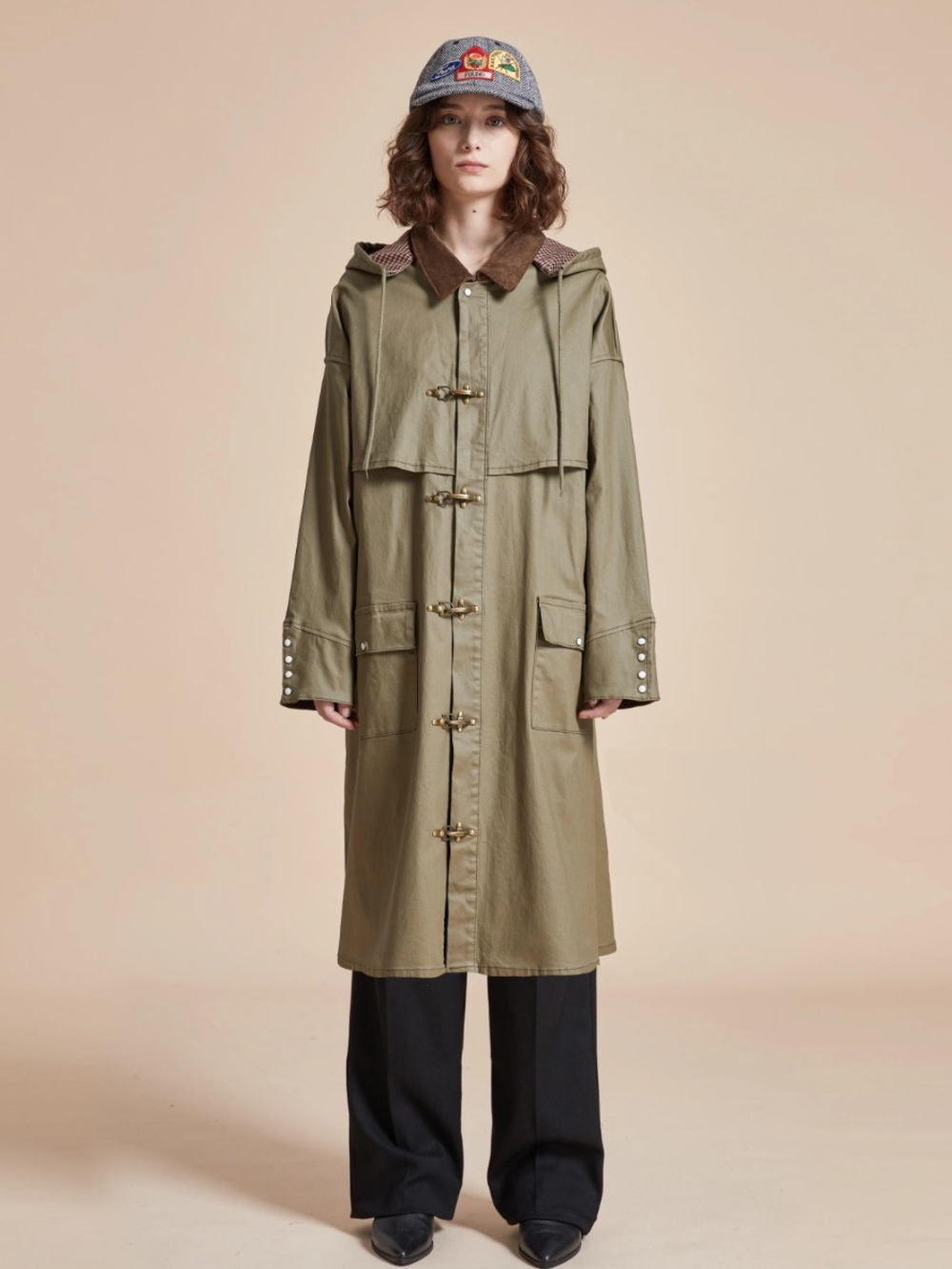 PRAIRIE BUCKLE COAT
in olive
NWOT
FOUND
UNISEX